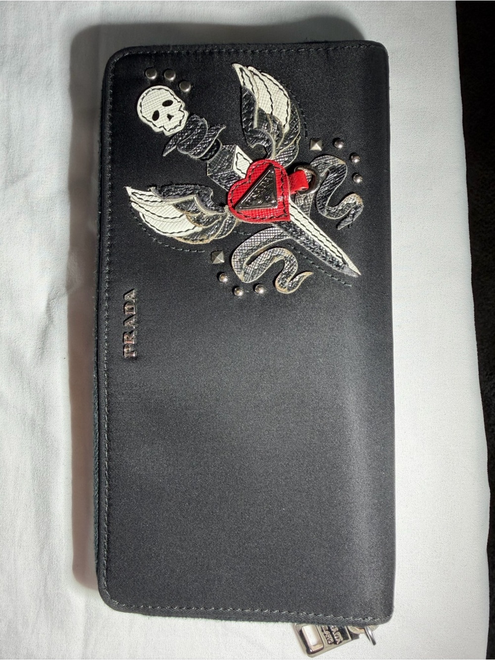 Prada Black Wallet with Embroidered Wing, Dagger & Red Heart Accent